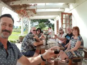 Group enjoying a wine tasting experience in the Cape Winelands